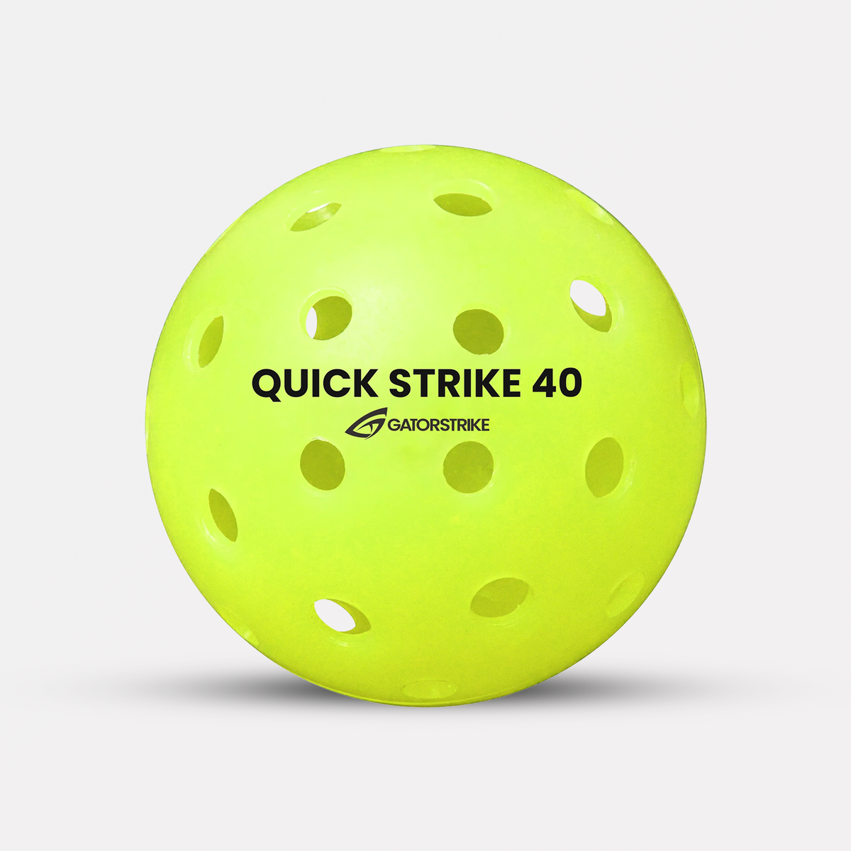 Quick Strike 40 outdoor pickleballs in hot green